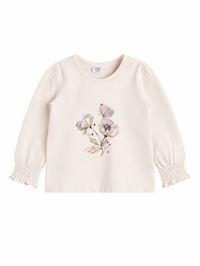 Hust & Claire cremefarvet pigebluse med blomsterprint og sommerfugl