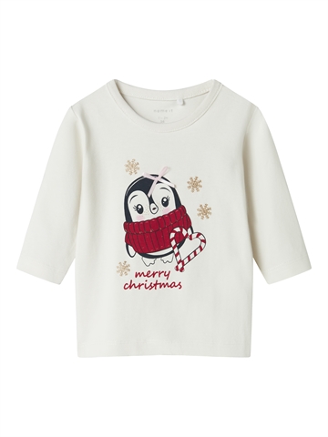 Cremehvid Name It julebluse med pingvin, slikstok og Merry Christmas tekst set forfra
