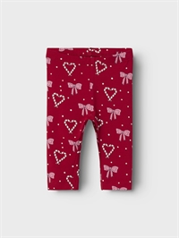 Røde juleleggings fra Name It med prikker og sløjfer set bagfra